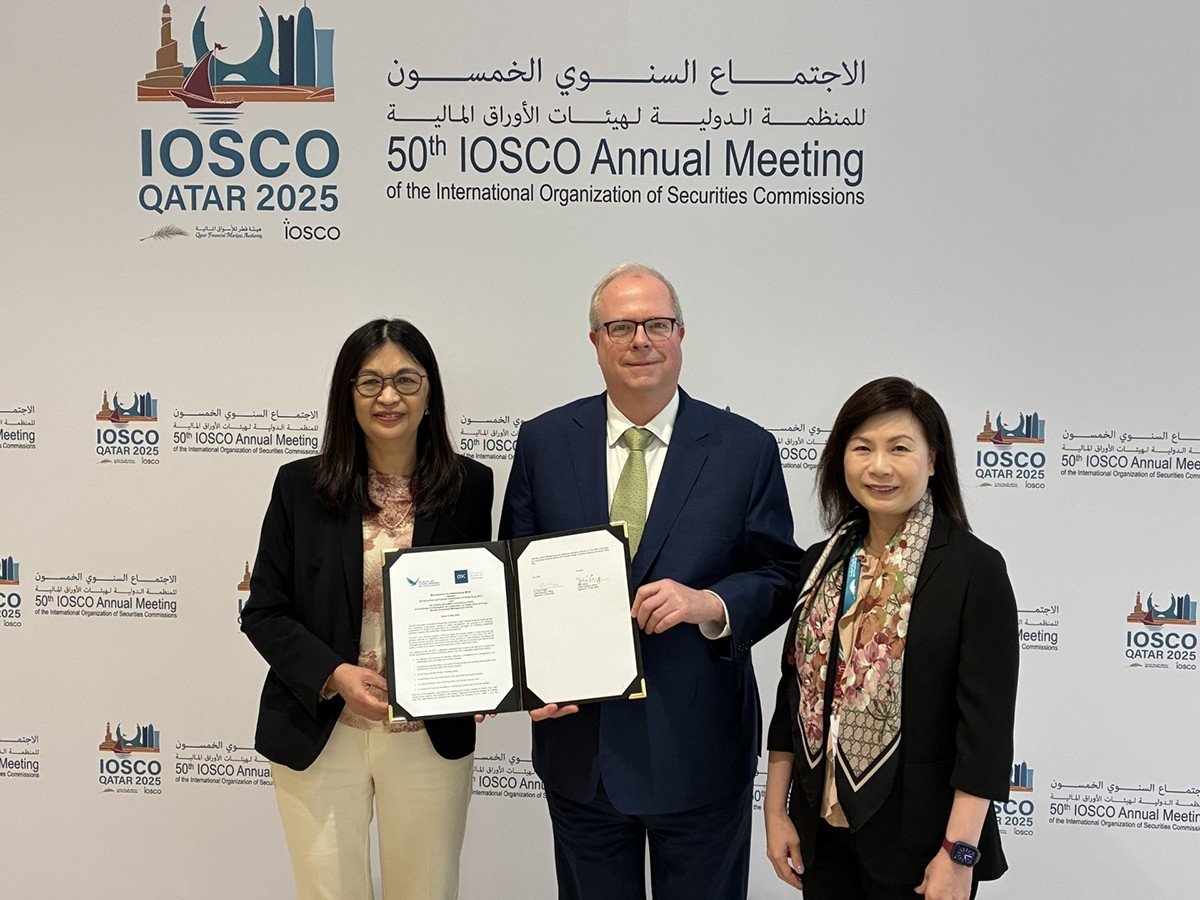 OSC CEO Grant Vingoe with SFC officials holding signed Memorandum of Understanding