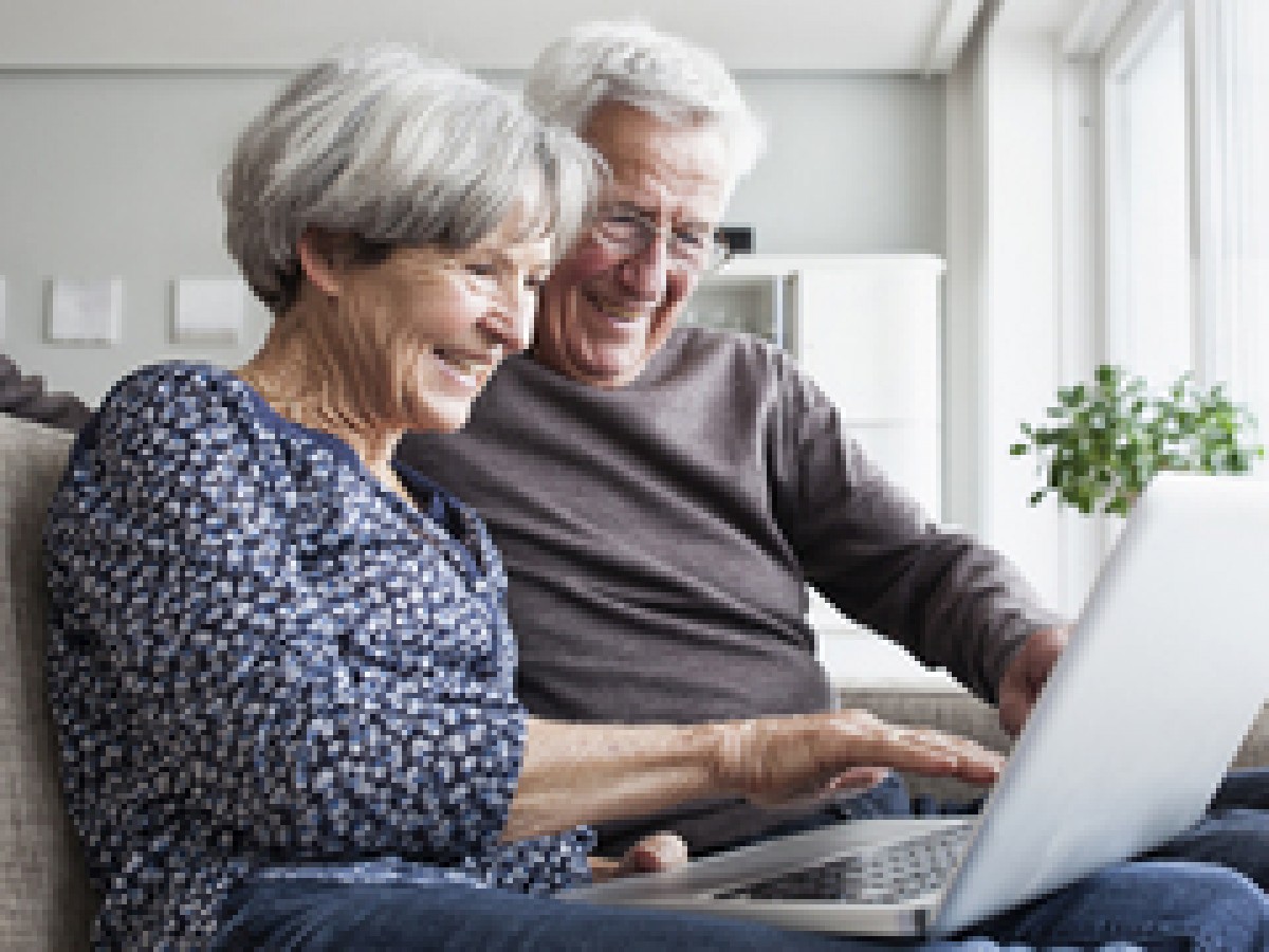 couple looking at laptop