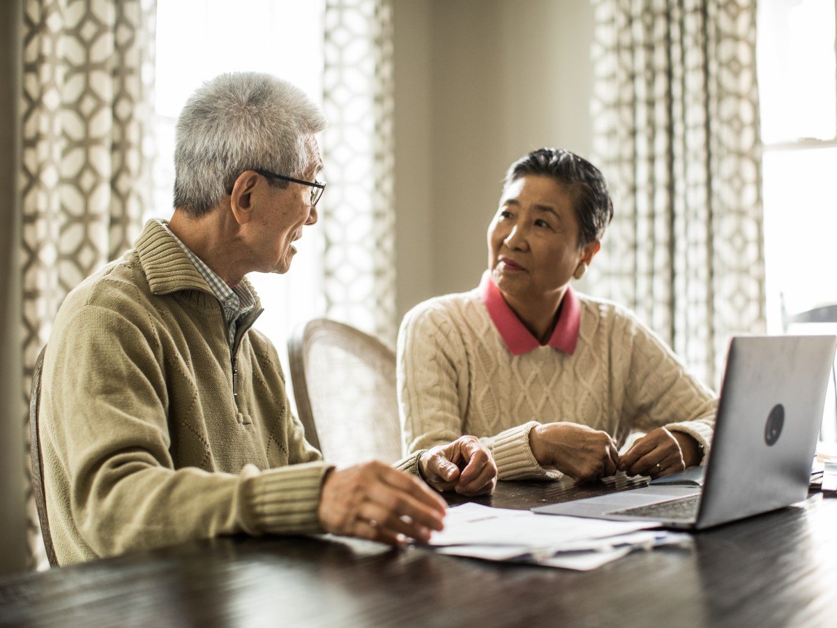 Events - senior couple with laptop