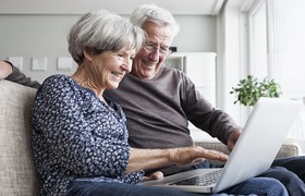 couple looking at laptop