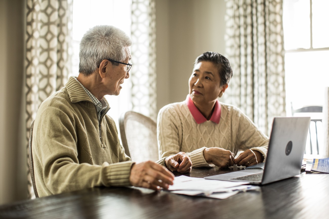 Events - senior couple with laptop