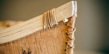 Stitching disparate materials together into a functional whole—a metaphor for Reconciliation.