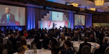 The Honourable Peter Bethlenfalvy, Minister of Finance, Ontario addresses the OSC Dialogue crowd 