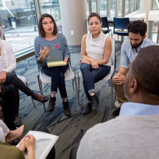 Event - group sitting on chairs in a circle