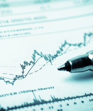 Pen on market data page of a newspaper